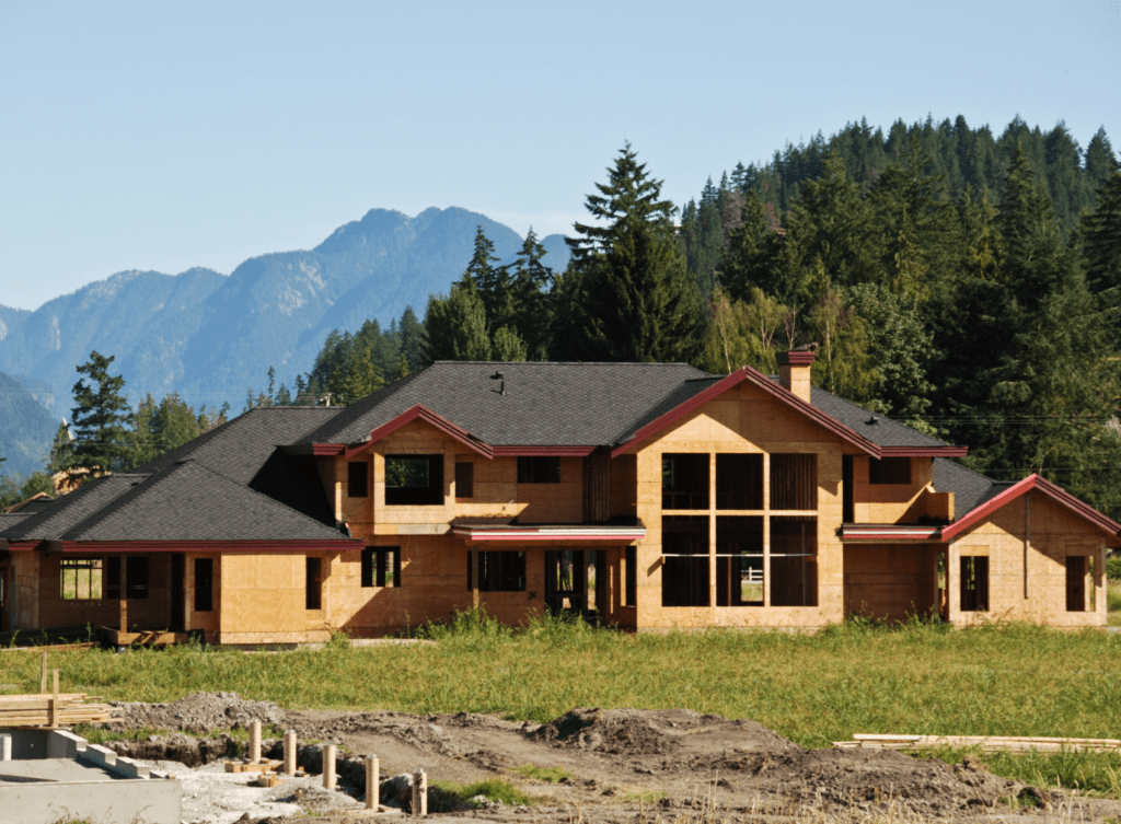 a luxury home in the mountains that is  under construction